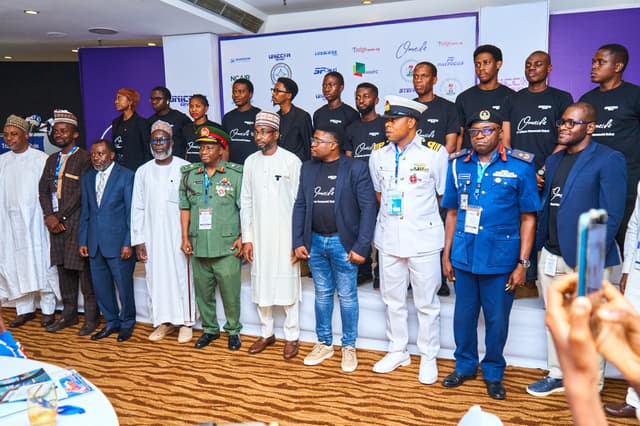 Omeife interacting with people